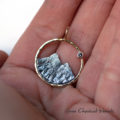 Gold and silver mountain pendant