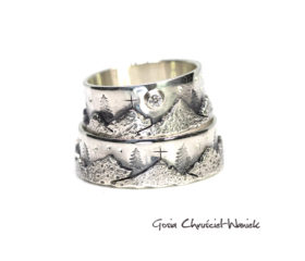 Obrączki ślubne z górami i brylantem